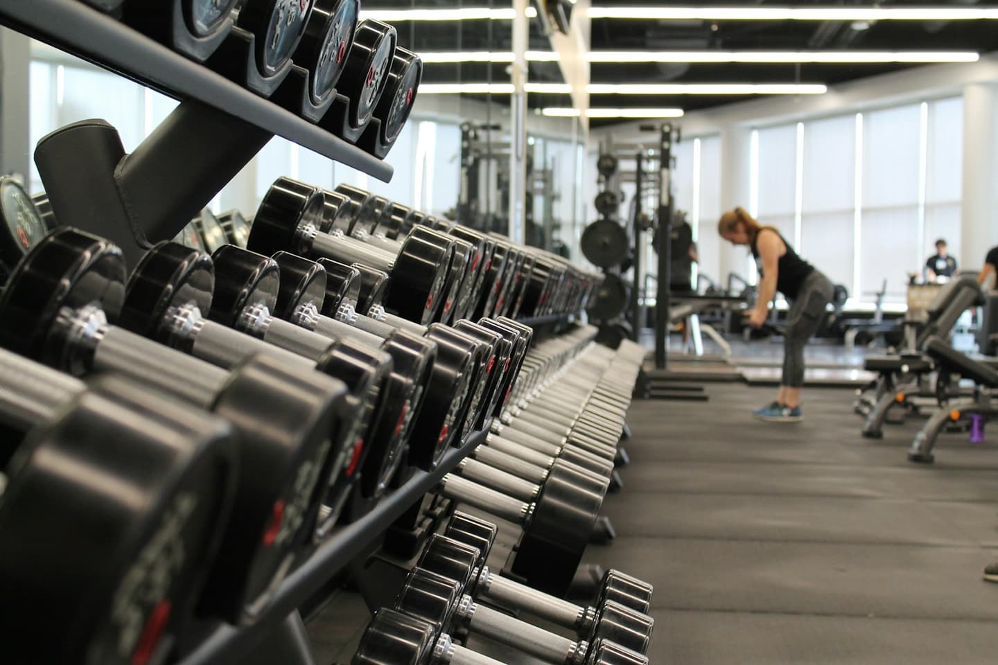Gym floor in Bangalore with free weights and cardio equipment